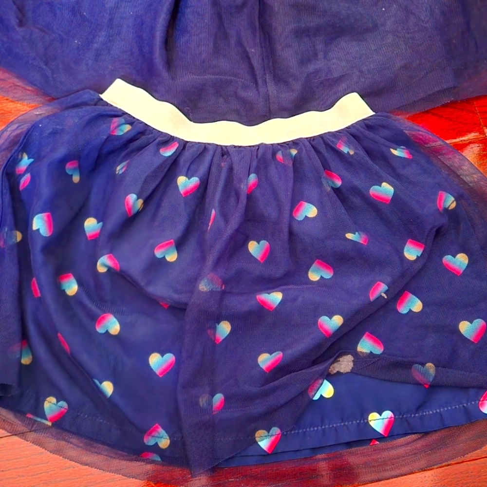 Carter tutu skirt in Navy Blue with rainbow hearts.